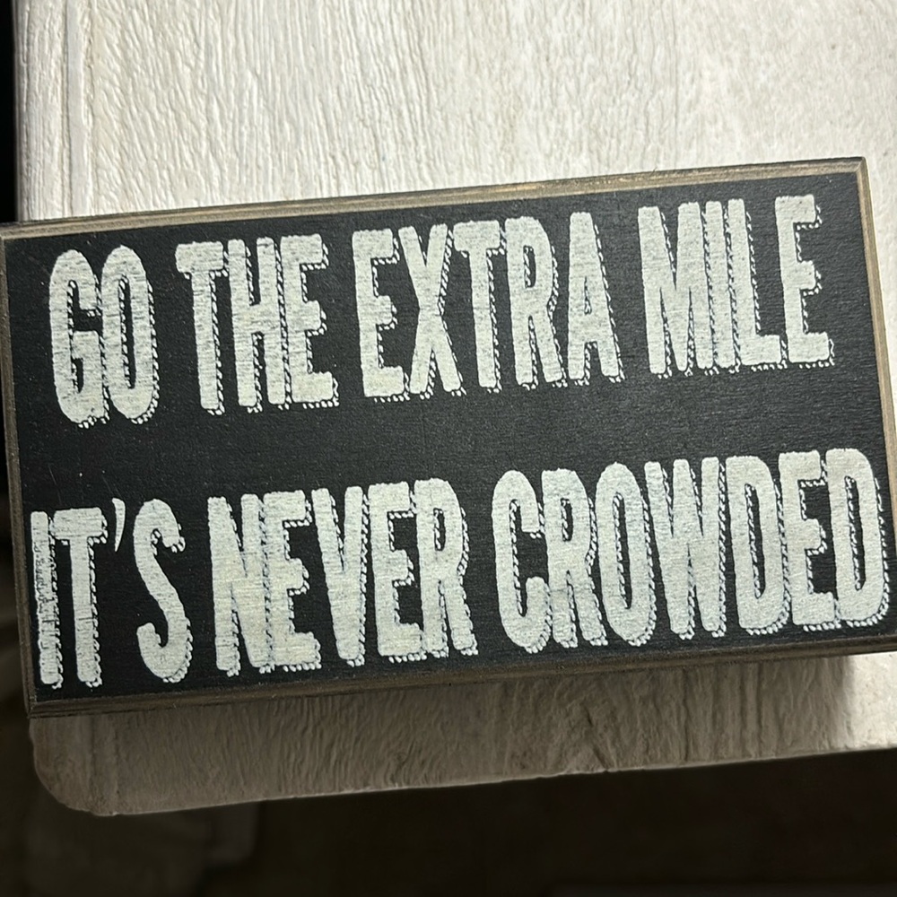 Go the Extra mile sign